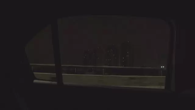 来自行驶中的汽车外的城市视频素材插图